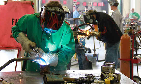 welding students in skills lab