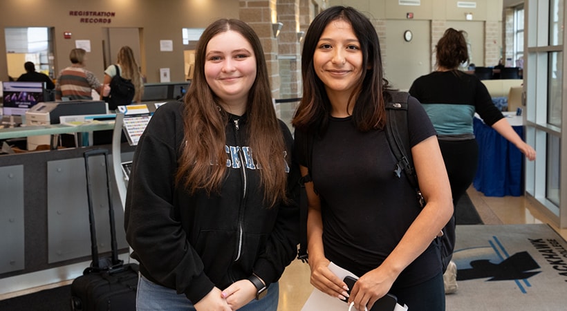 Students in Welcome Center area of Central building