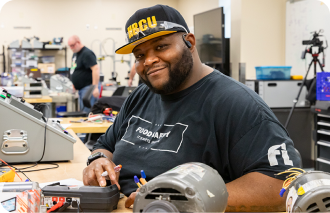 Electro-Mechanical Technology student Cordell Dixon in the classroom